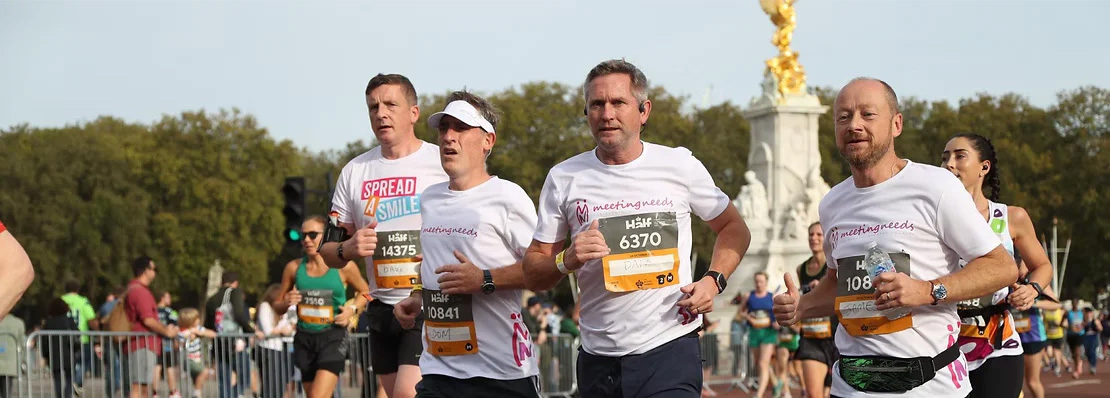 Dan with other marathon runners supporting Meeting Needs