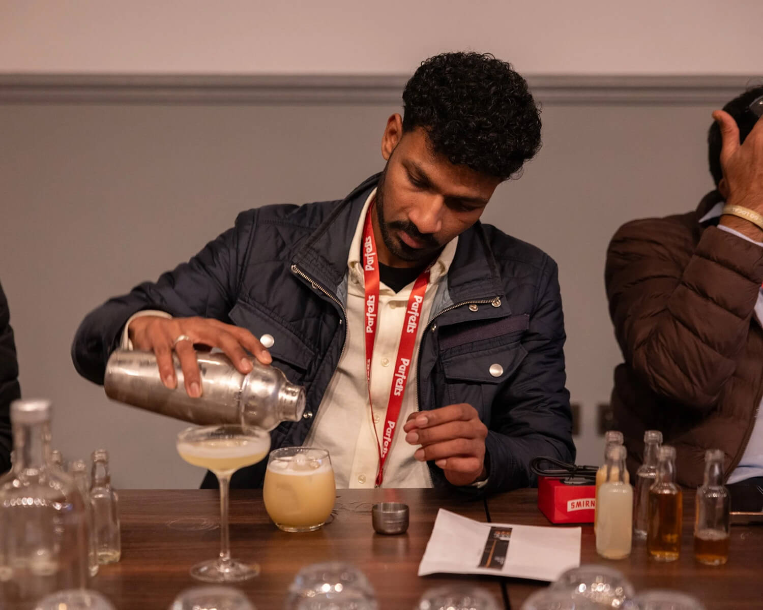Attendees making their own cocktails in masterclass