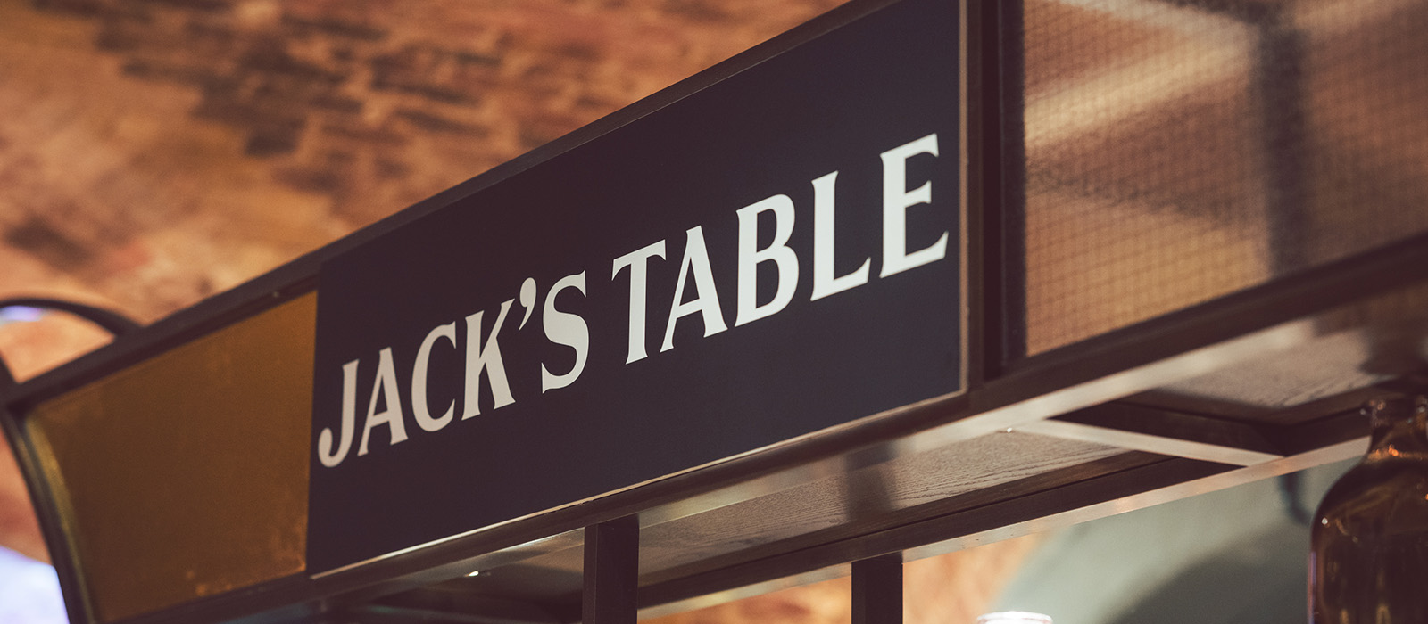 Branded bar signage displaying 'Jack's Table'