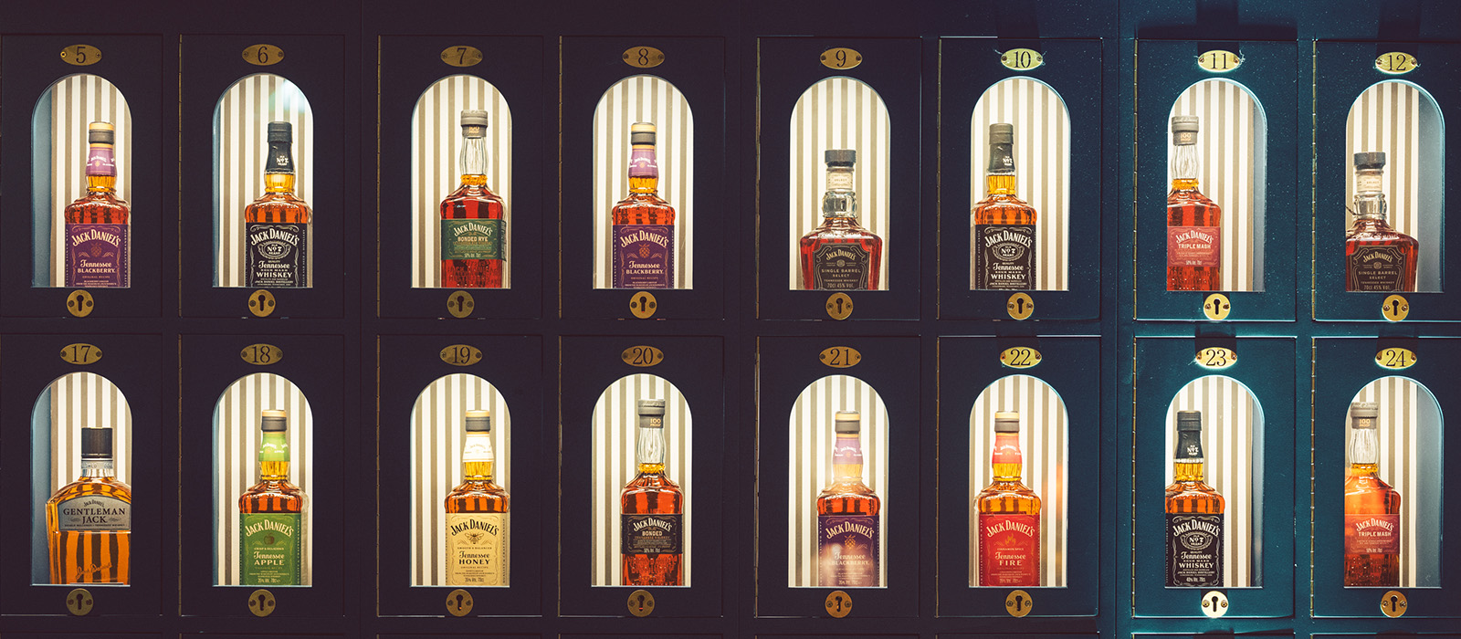 Various Jack Daniel's bottles placed in archways