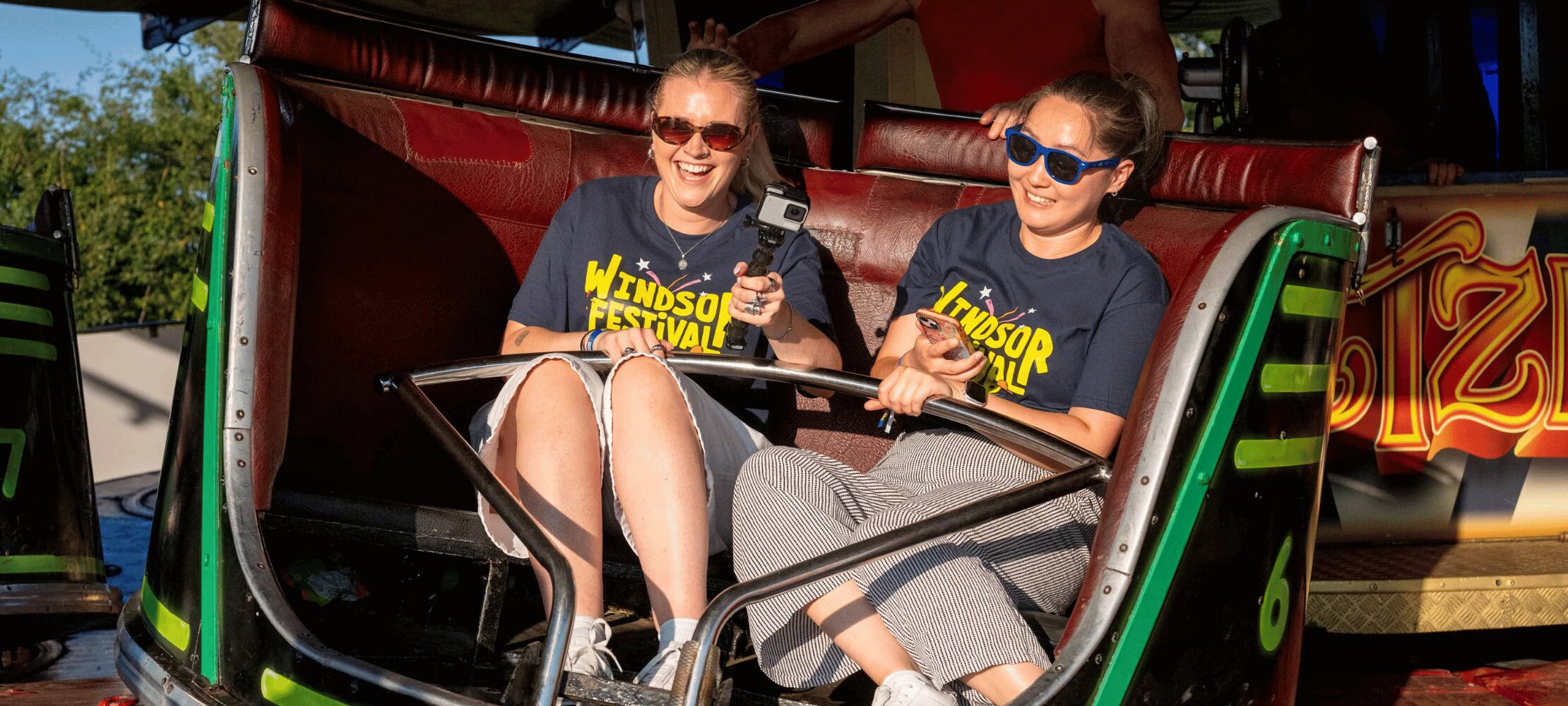 Visitors enjoying a fairground ride