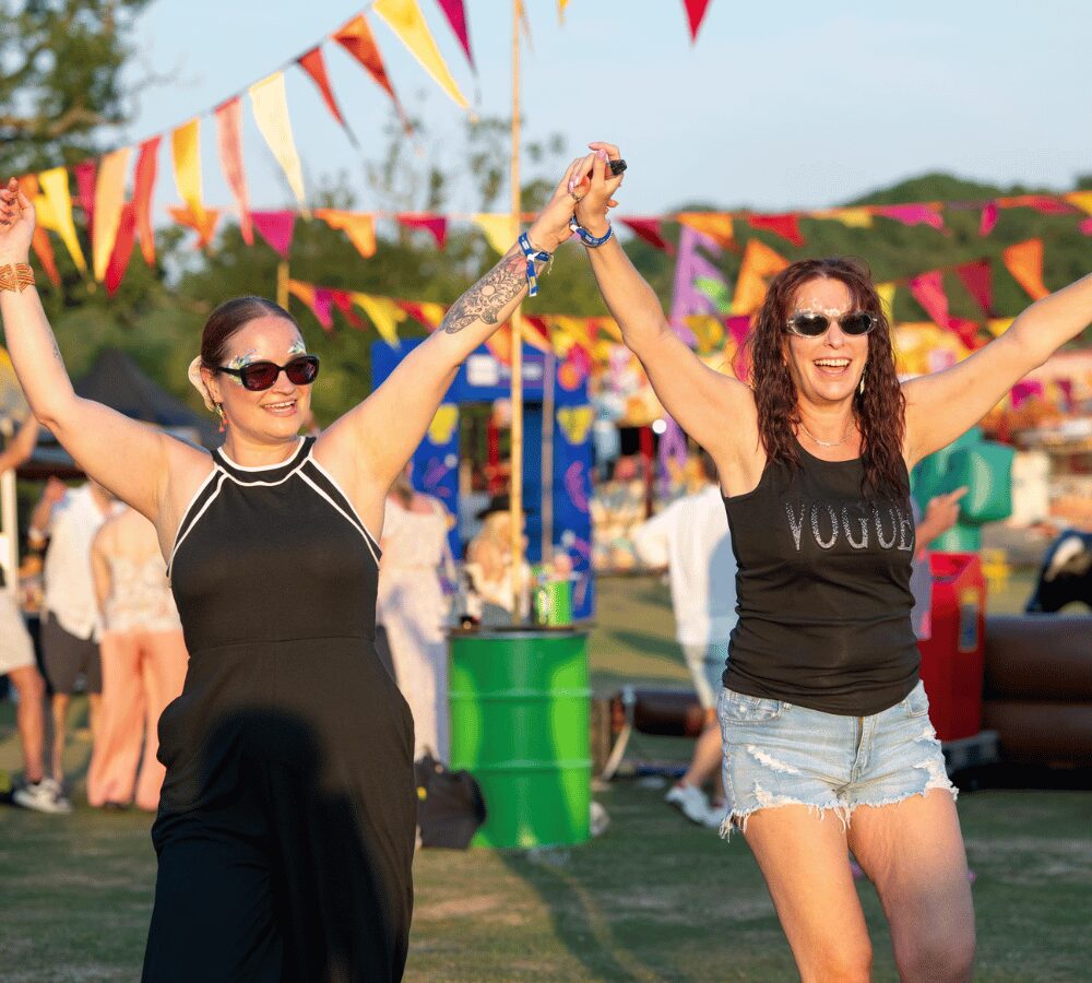 Visitors enjoying the Windsor Festival decorated with colourful bunting