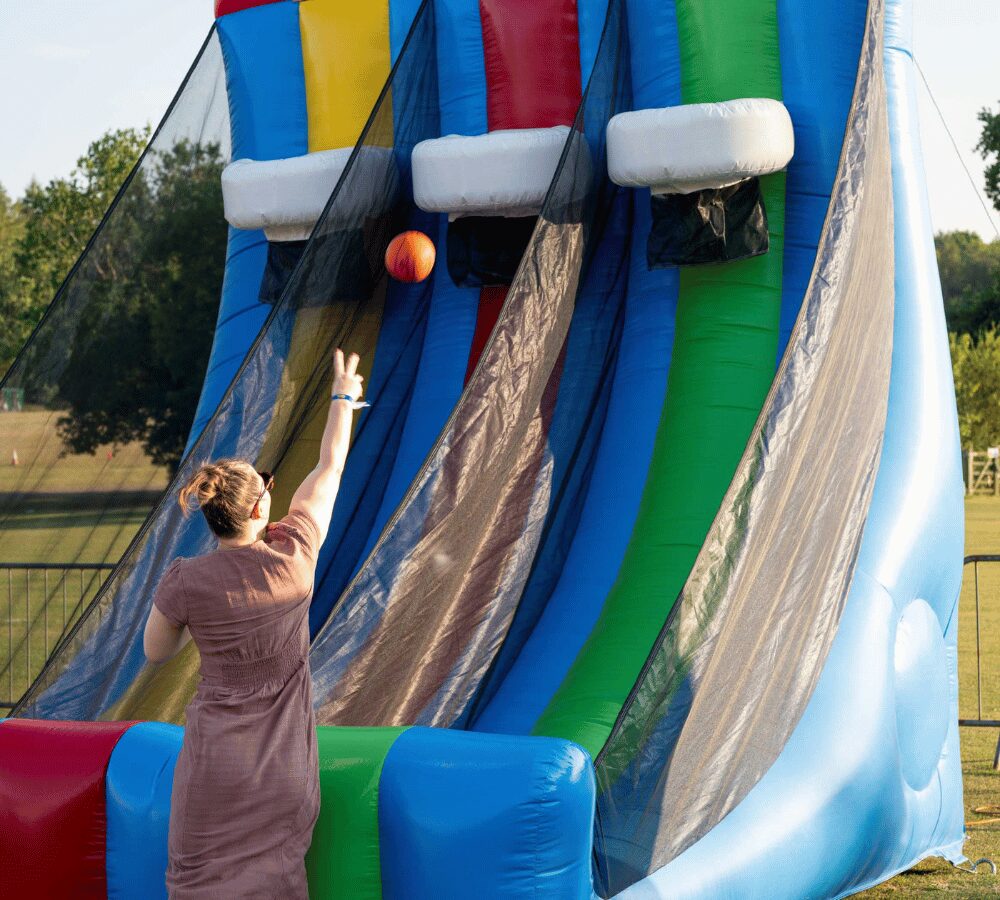 Visitor playing on a giant inflatable slide